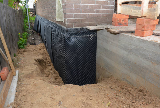 SJ Waterproofing Pros technician performing targeted Sump Pump Installation assessment in Clear Brook, VA